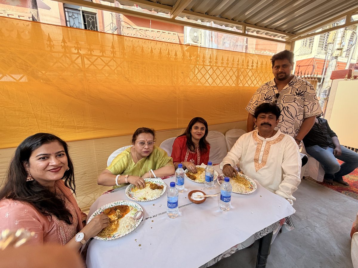 Family eating together on the terrace during the celebration
