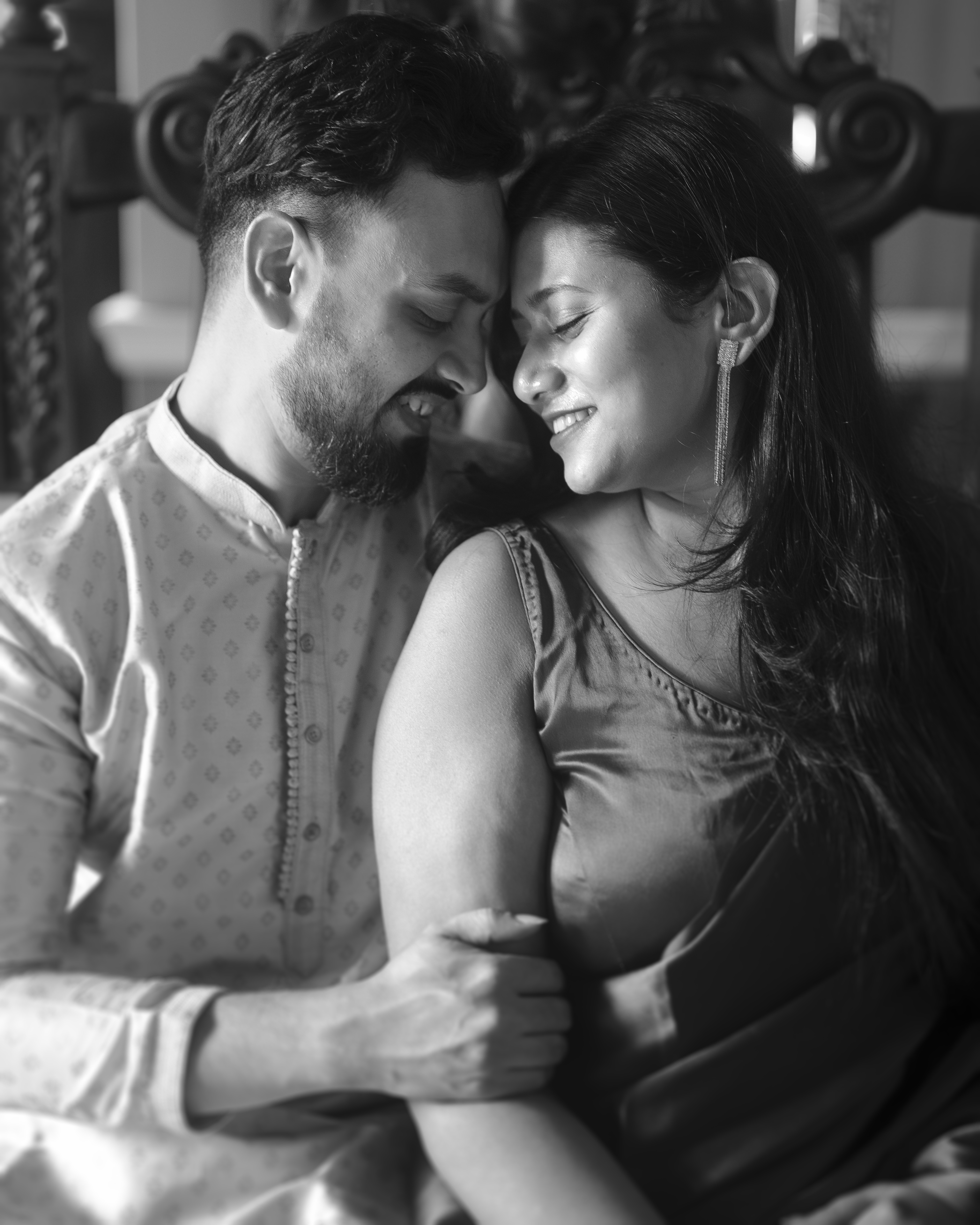 Black and white close-up of Rituparna and Shoumo with foreheads touching tenderly