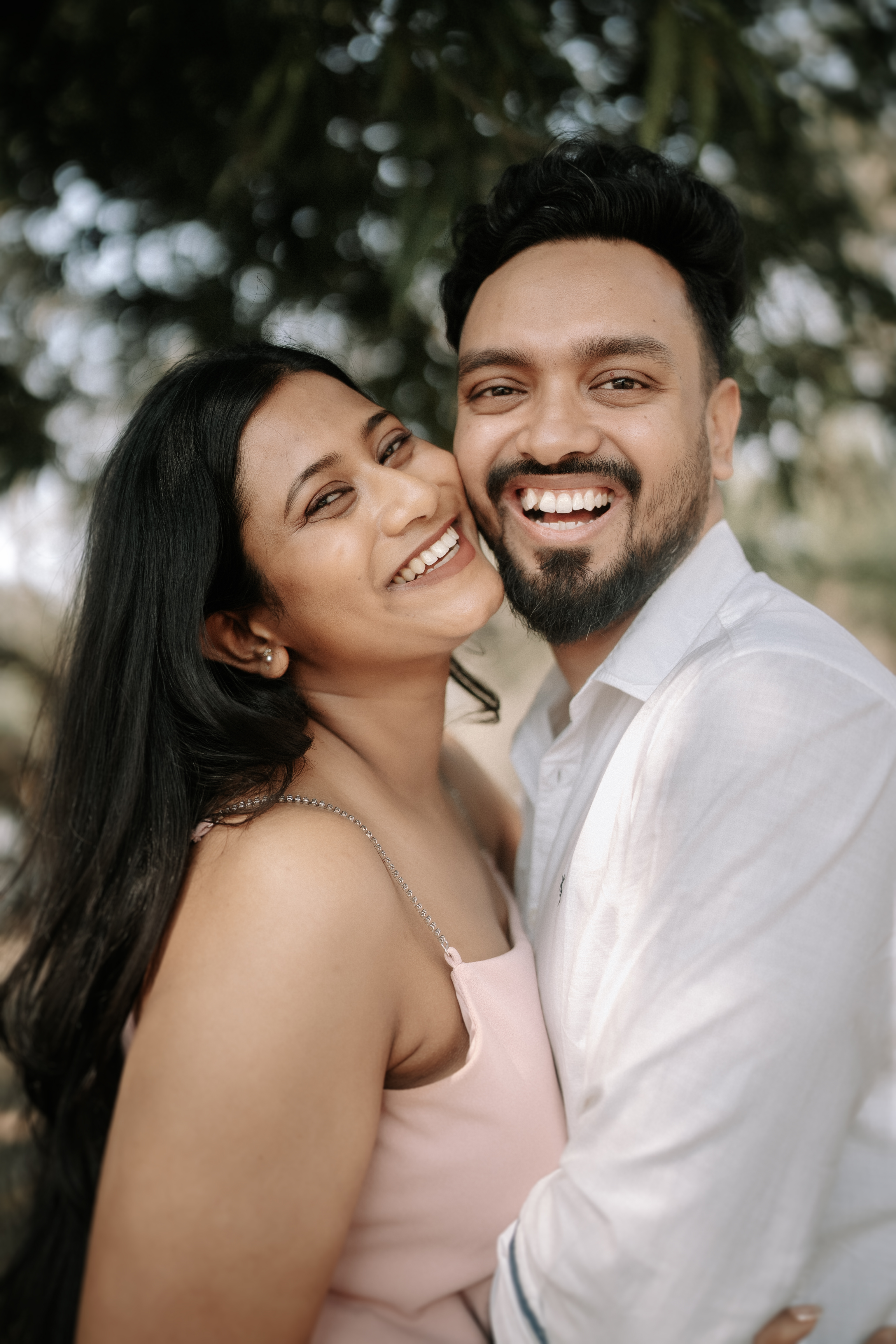 Close-up of Rituparna laughing with genuine, radiant joy