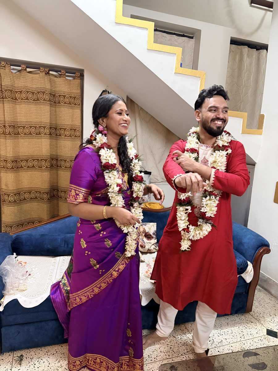 Rituparna and Shoumo at the dining table during the wedding feast
